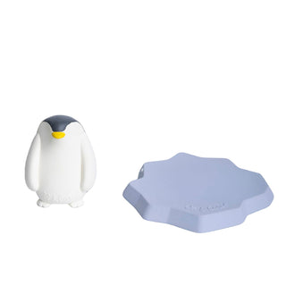 Oli & Carol natural rubber penguin bath toy and blue iceberg base shown separately, hand-painted Hevea rubber