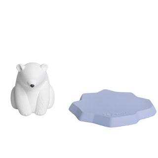 Oli & Carol natural rubber polar bear and blue iceberg base displayed separately, hand-painted Hevea rubber baby bath toy