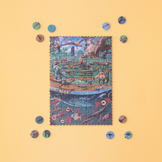 Completed 50-piece tiny dinosaur jigsaw with species fact cards showing size, weight and diet, Londji Dinosaurs Tiny pocket prehistoric puzzle for dino-mad children