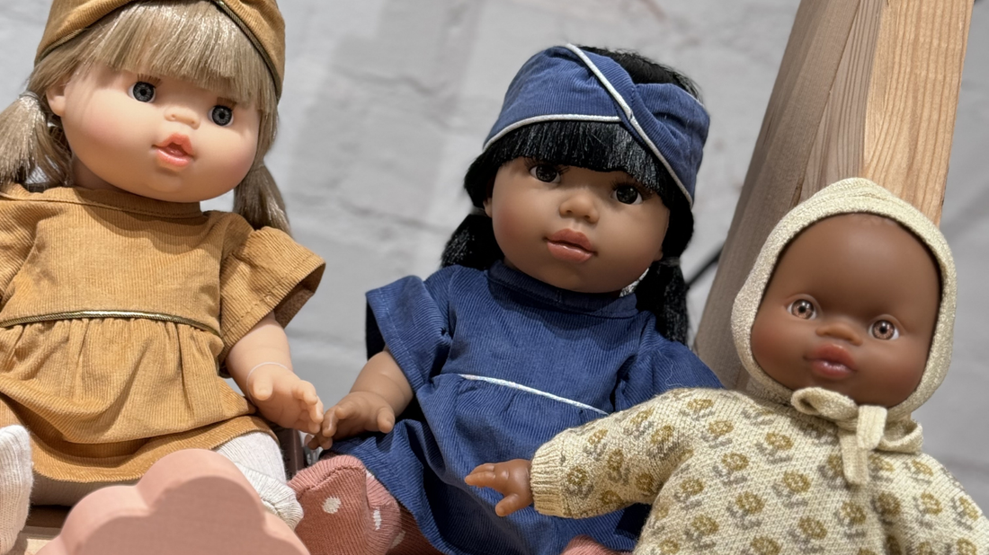Minikane dolls dressed in stylish outfits, showcasing diversity and thoughtful design—perfect educational toys and timeless gifts for imaginative play.