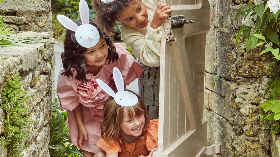 Kids playing with Easter crafts, puzzles, and outdoor toys during spring break