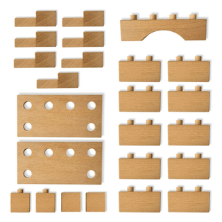 Wooden building blocks set showing 24 solid beech pieces in assorted geometric shapes with cotton drawstring storage bag, Brick A Block Starter open-ended construction toy