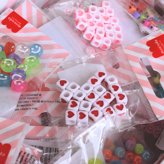 Emoji and symbol beads for kids' friendship bracelets in a handy bead bar, La Petite Épicerie fun printed acrylic craft beads for personalising jewellery