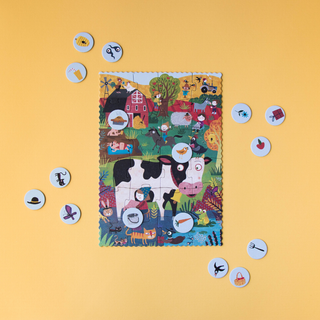 Completed 24-piece pocket farm jigsaw showing pigs, sheep, chickens and cow in a sunny scene, Londji My Little Farm portable puzzle for travel and restaurants