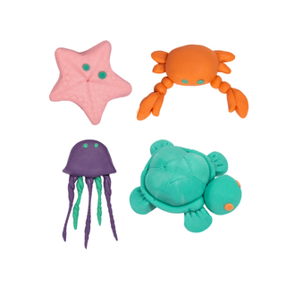Sea creatures sculpted with Loolipo Pataqua complementary colour play dough including pink starfish, orange crab, purple jellyfish and green turtle, plant-based ocean-themed creations
