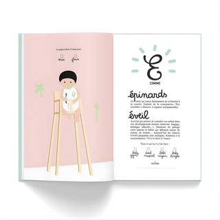 Baby milestone journal open showing first year recording pages in French, Minus Éditions keepsake documenting first smiles, first words and first steps for new parents raising children in French