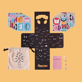 Monster speed game open showing dice and creature cards with colours, spots, fur and scales to match, Londji My Monsters race-to-build game with adjustable difficulty