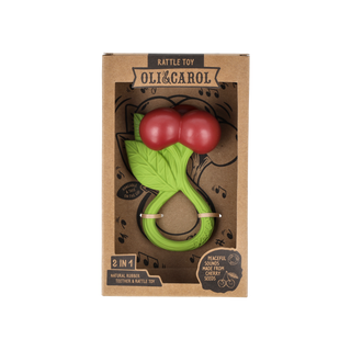 Oli & Carol cherry rattle toy in kraft packaging showing 2-in-1 natural rubber teether and rattle with cherry seed sounds