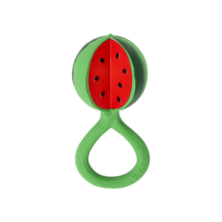 Oli & Carol watermelon slice baby rattle in green natural Hevea rubber with hand-painted red flesh and seed detail
