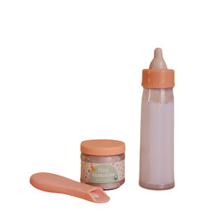 Tiny Harlow My First Tiny Tummies Gift Pack featuring magic disappearing milk bottle, baby cereal food jar and feeding spoon for dolls