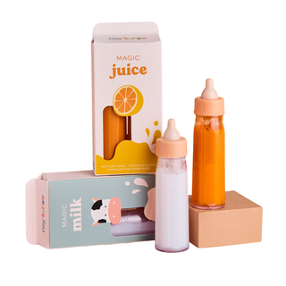 Tiny Harlow Tiny Tummies magic milk and magic juice doll bottles with disappearing liquid, shown with colourful gift-ready packaging