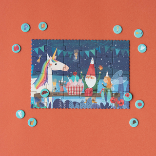 Completed 24-piece tiny unicorn jigsaw showing birthday party scene with matching observation cards, Londji Unicorn Tiny enchanting pocket puzzle for girls aged 3 plus